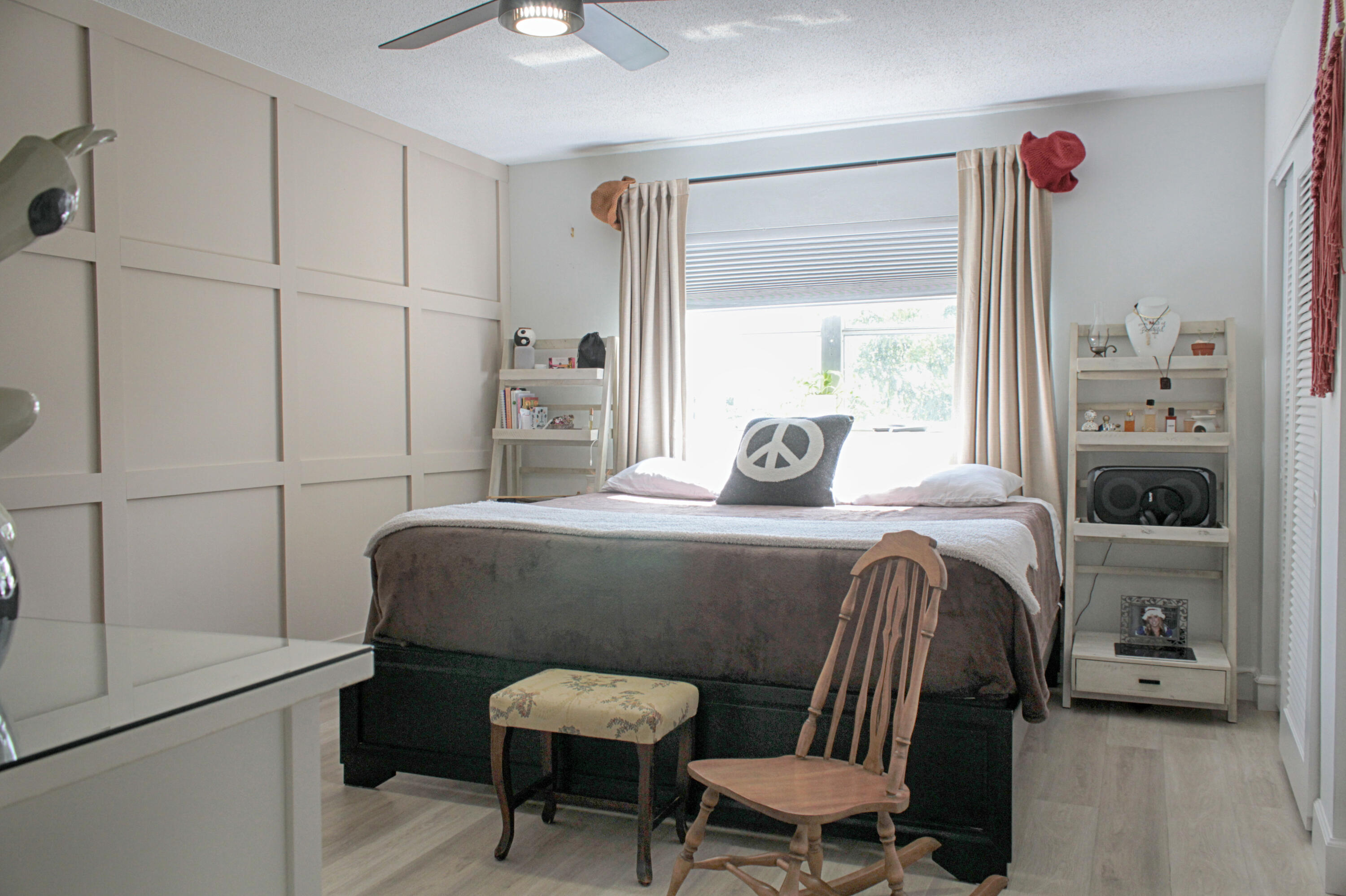 2615 Northeast 1st Court, Unit 307 Boynton Beach, FL 33435 - Photo 1 of 22 a bedroom with a bed and a window