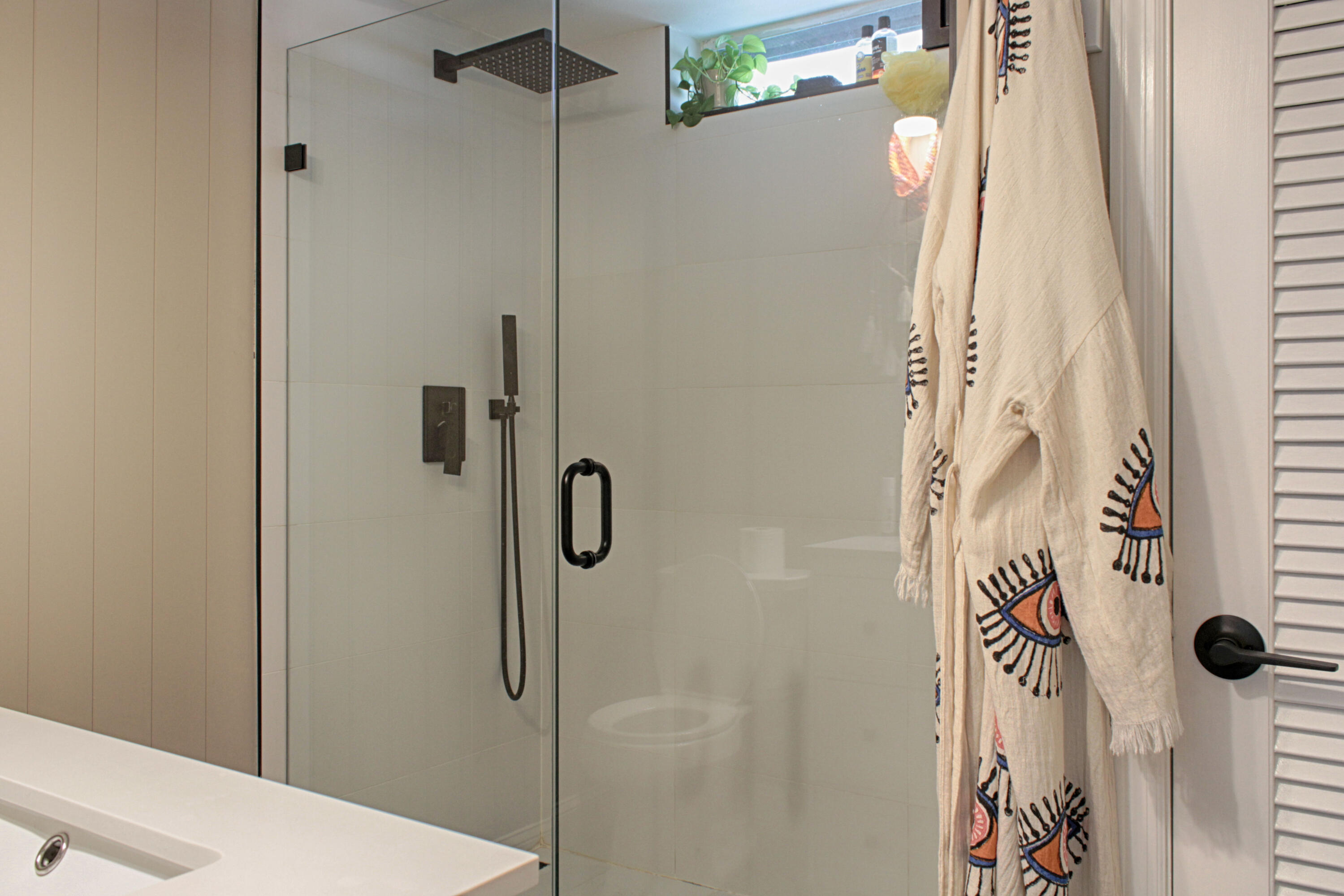 2615 Northeast 1st Court, Unit 307 Boynton Beach, FL 33435 - Photo 12 of 22 a bathroom with a shower