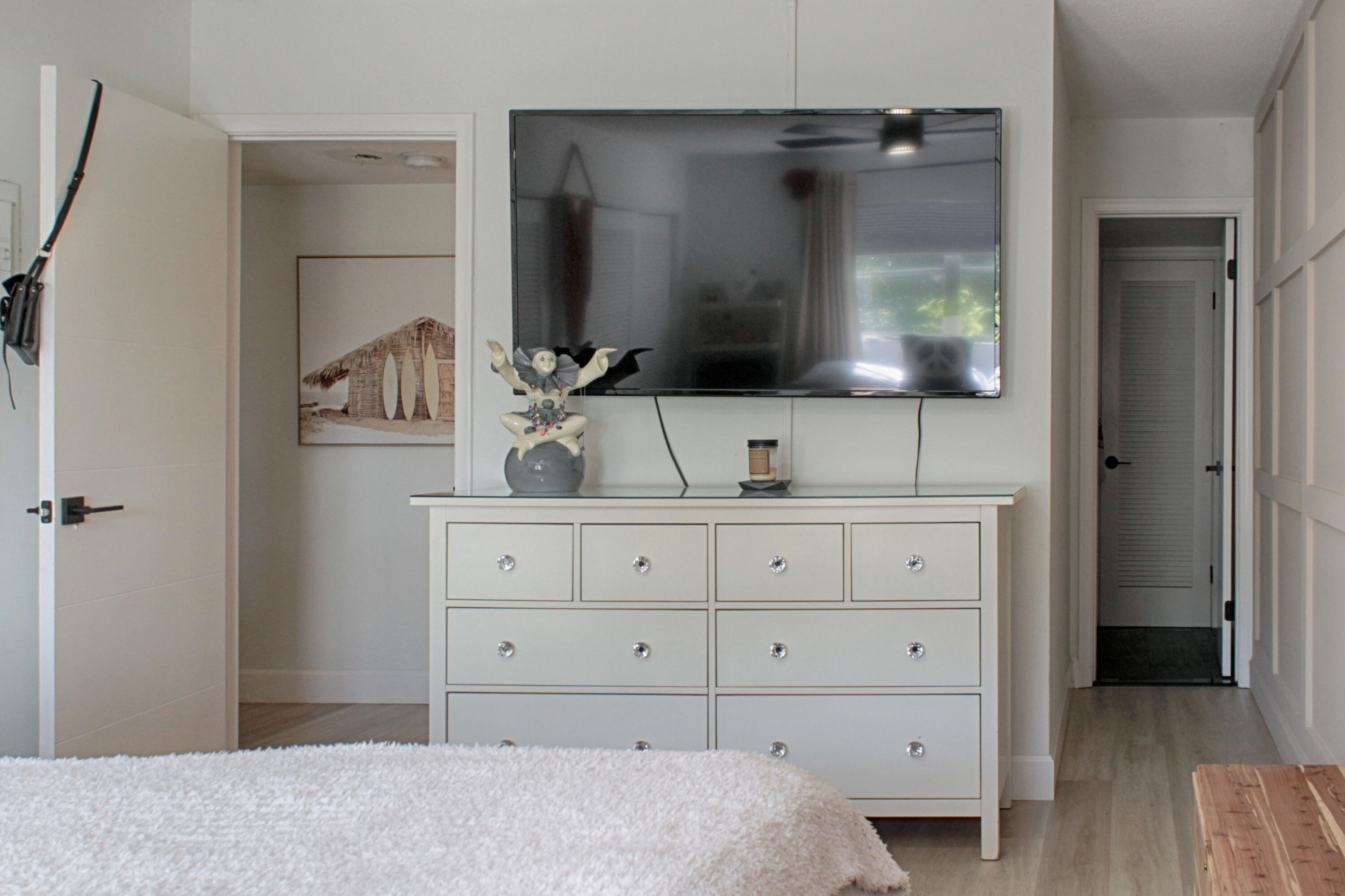 2615 Northeast 1st Court, Unit 307 Boynton Beach, FL 33435 - Photo 14 of 22 a view of a dresser