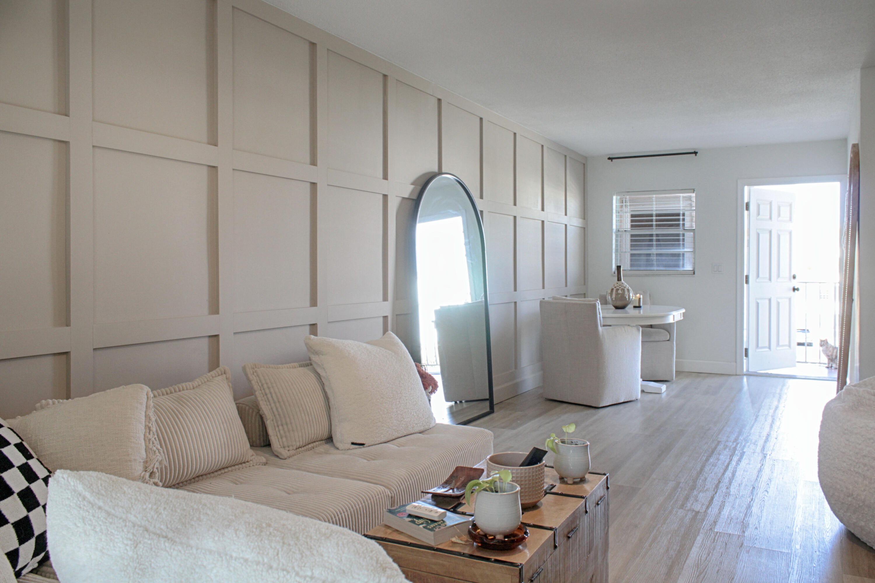 2615 Northeast 1st Court, Unit 307 Boynton Beach, FL 33435 - Photo 6 of 22 a living room with furniture and wooden floor