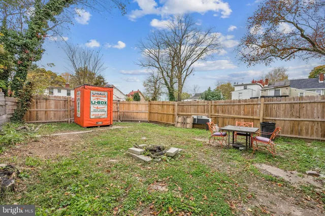 a view of a garden with a bench