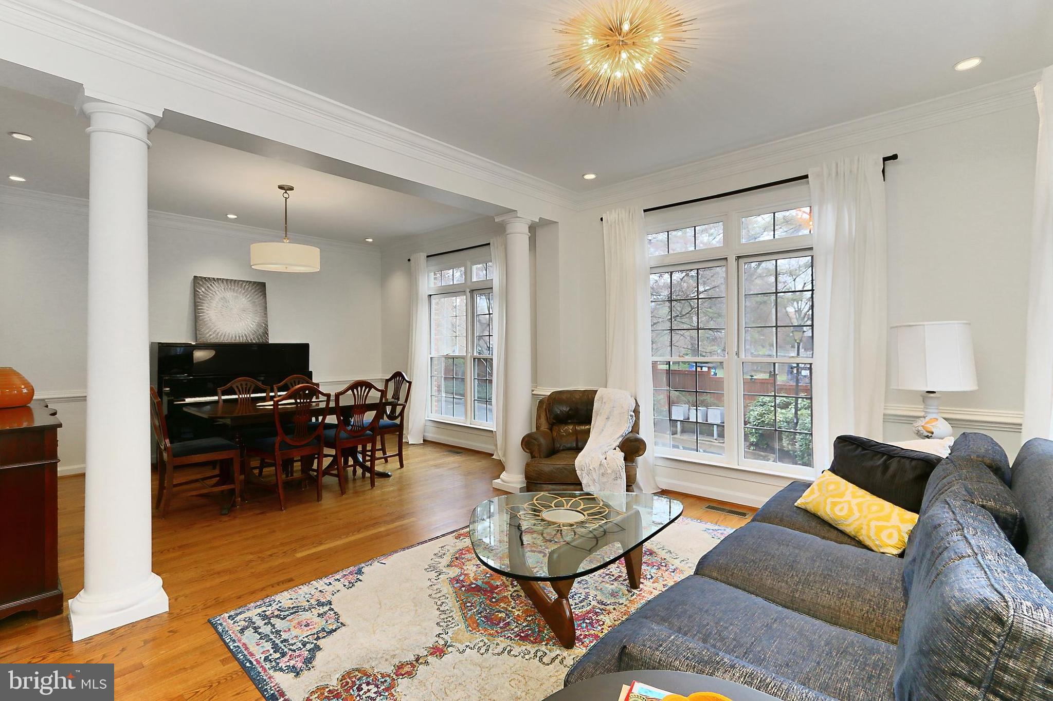 132 Rees Place Falls Church, VA 22046 - Photo 11 of 66 a living room with furniture and a dining table