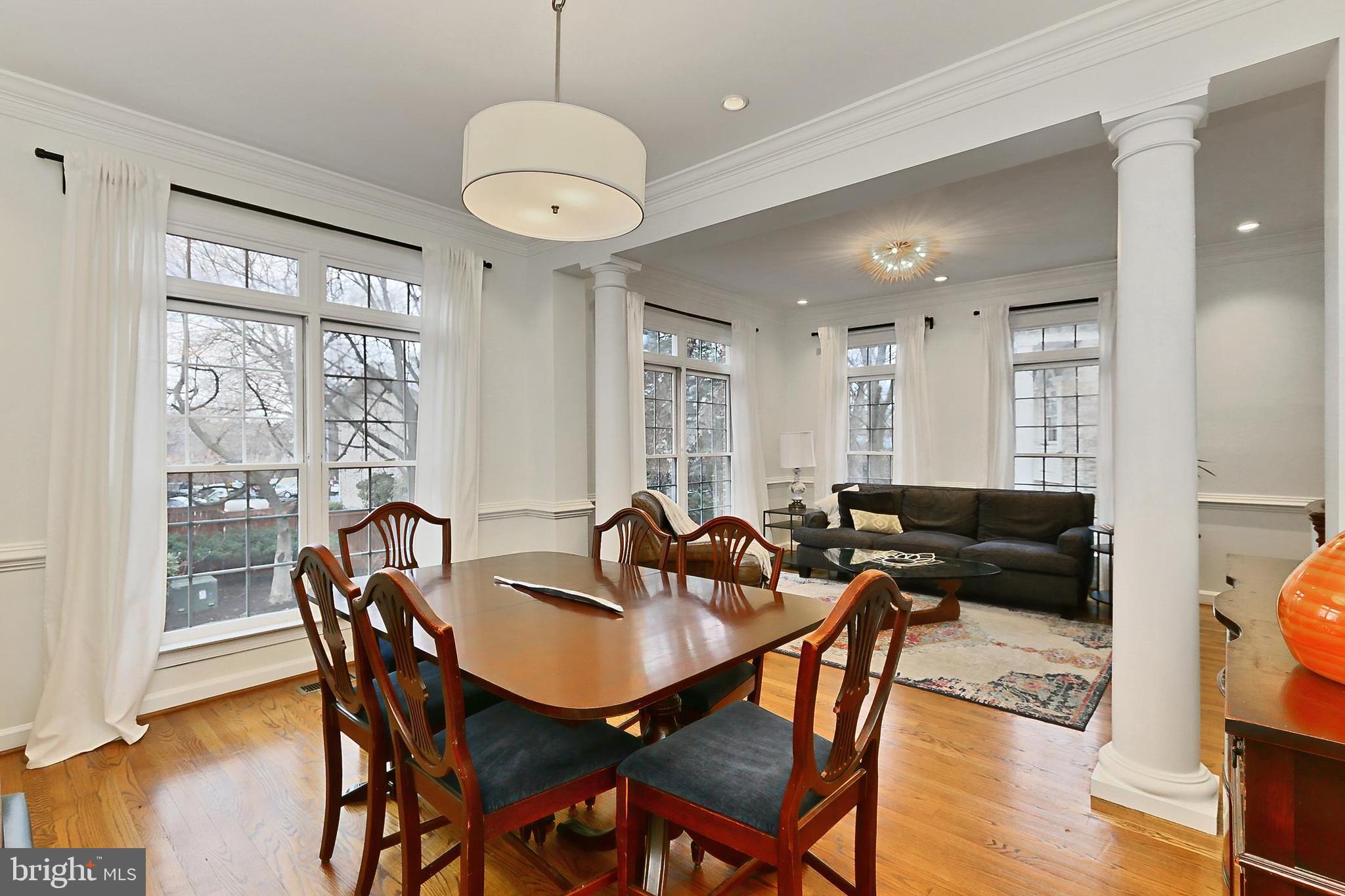 132 Rees Place Falls Church, VA 22046 - Photo 15 of 66 a view of a dining room with furniture window and wooden floor