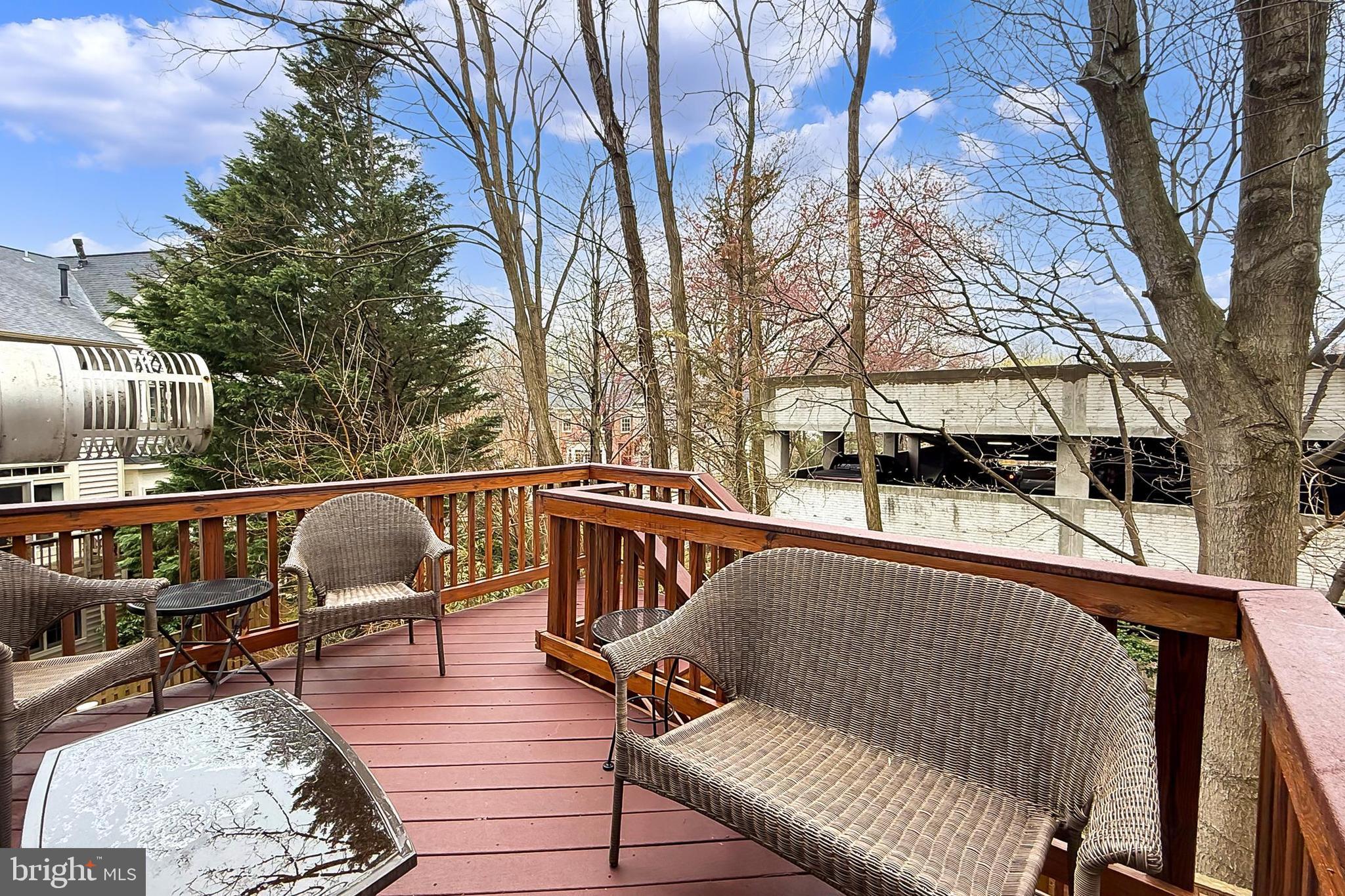132 Rees Place Falls Church, VA 22046 - Photo 27 of 66 a balcony with wooden floor and outdoor seating