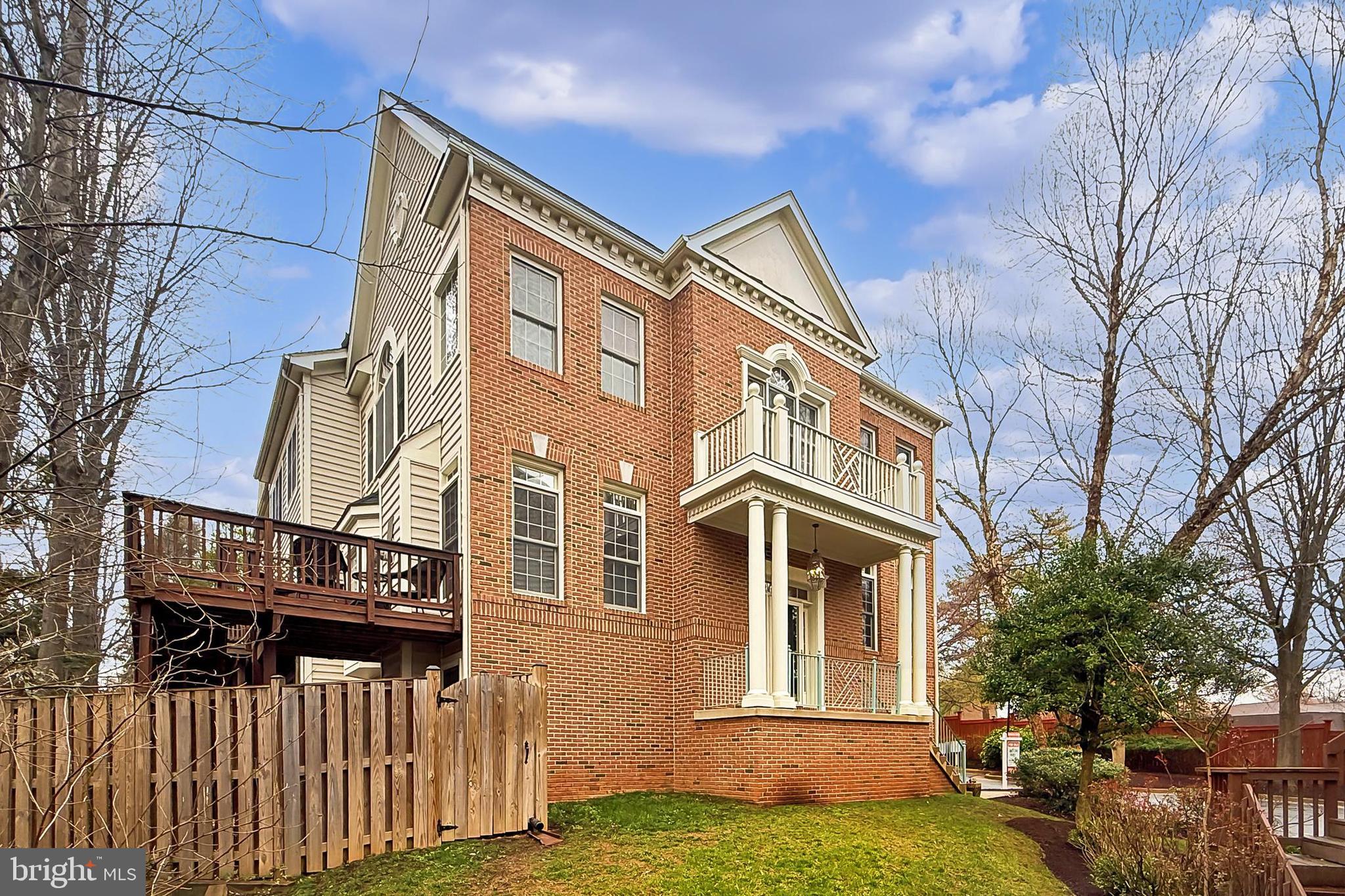 132 Rees Place Falls Church, VA 22046 - Photo 3 of 66 a front view of a house with a yard
