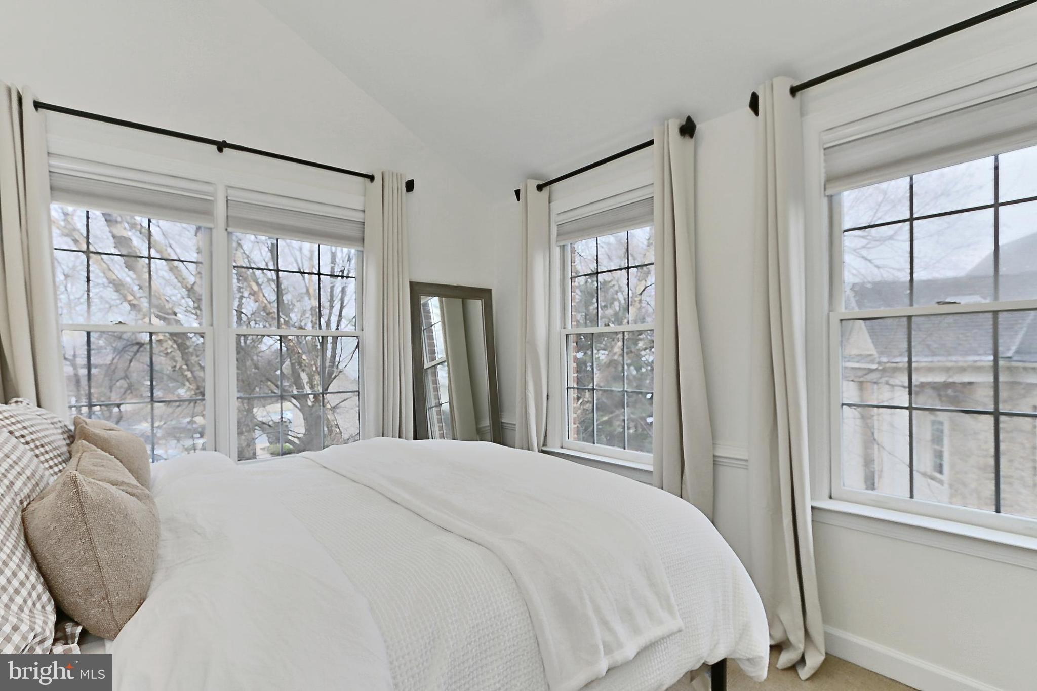 132 Rees Place Falls Church, VA 22046 - Photo 38 of 66 a bedroom with a large bed and a large window