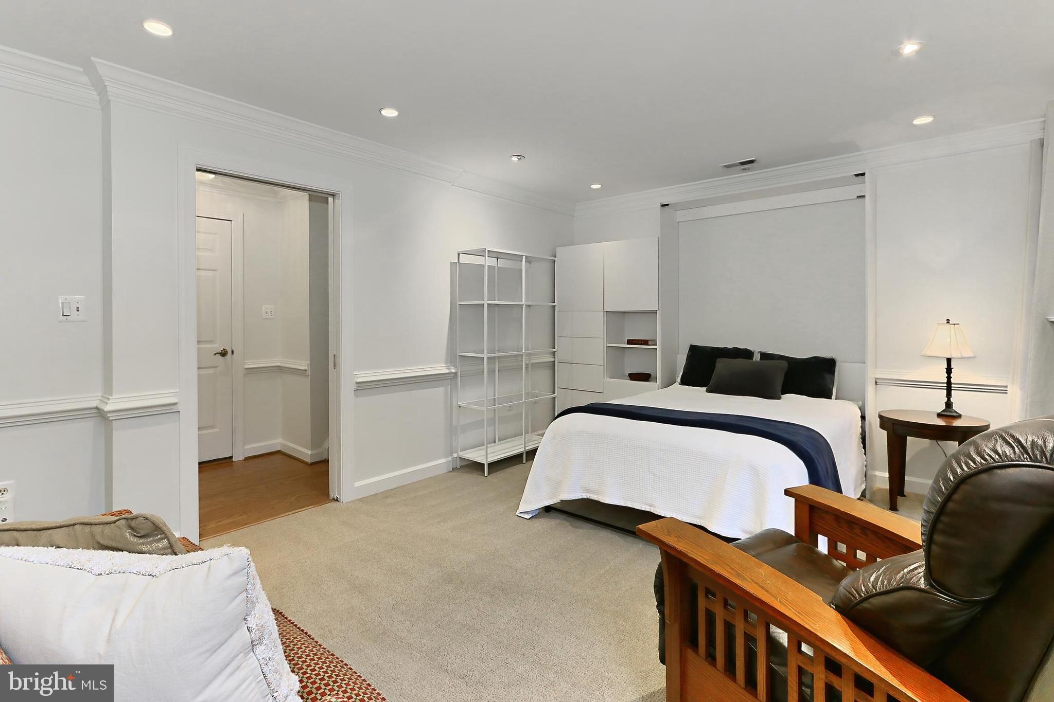 132 Rees Place Falls Church, VA 22046 - Photo 44 of 66 a bedroom with a bed and wooden floor