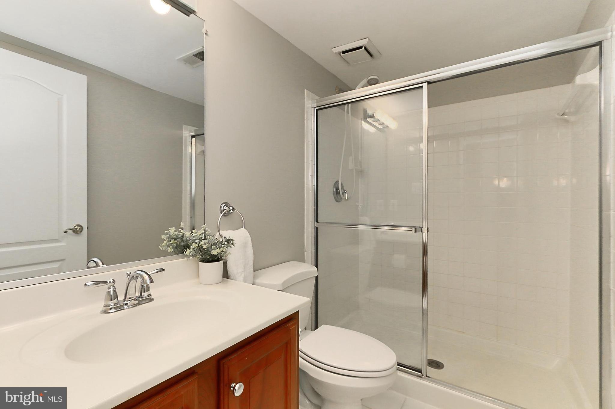132 Rees Place Falls Church, VA 22046 - Photo 46 of 66 a bathroom with a sink toilet and shower