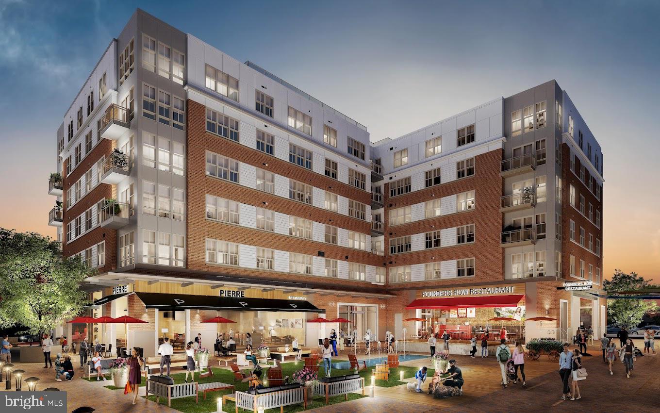 132 Rees Place Falls Church, VA 22046 - Photo 61 of 66 a view of a building with a lot of cars parked on the street