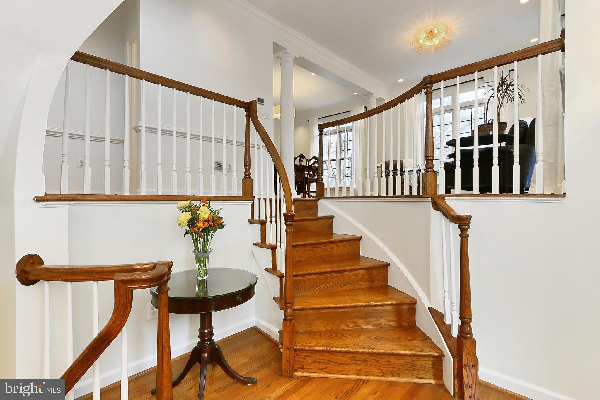 132 Rees Place Falls Church, VA 22046 - Photo 7 of 66 a view of entryway and hall with wooden floor