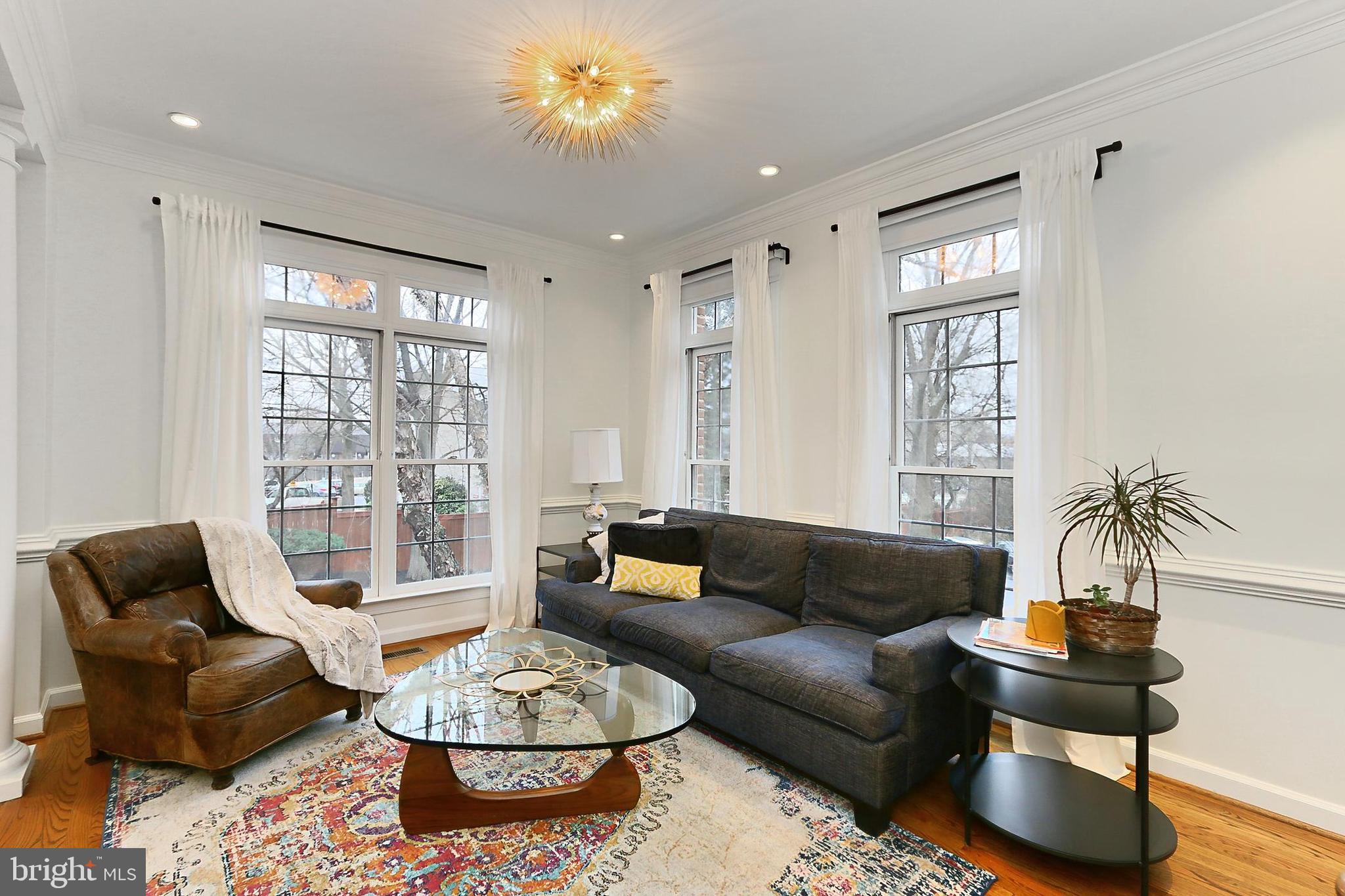 132 Rees Place Falls Church, VA 22046 - Photo 9 of 66 a living room with furniture and a large window