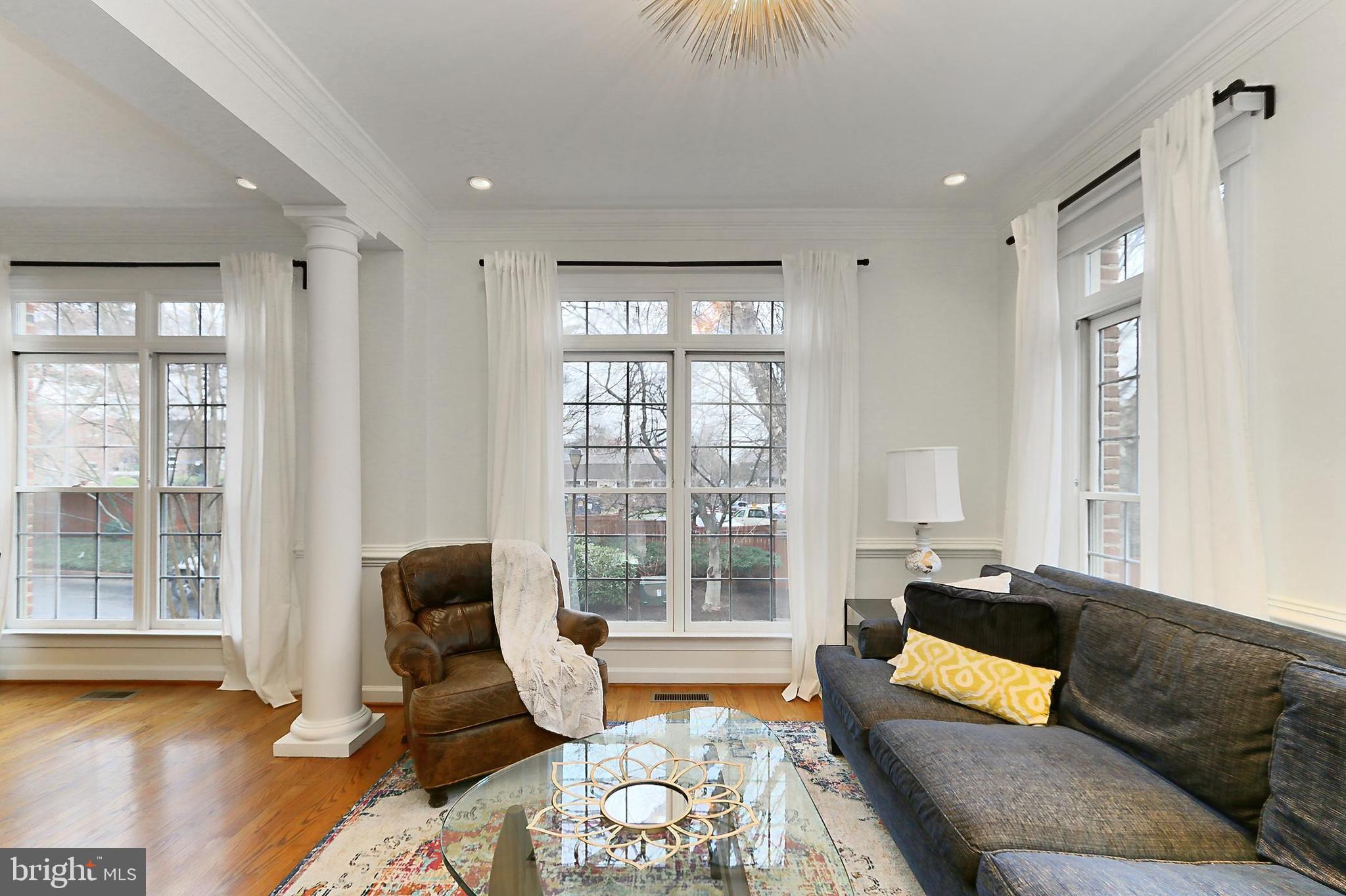 132 Rees Place Falls Church, VA 22046 - Photo 10 of 66 a living room with furniture and a large window