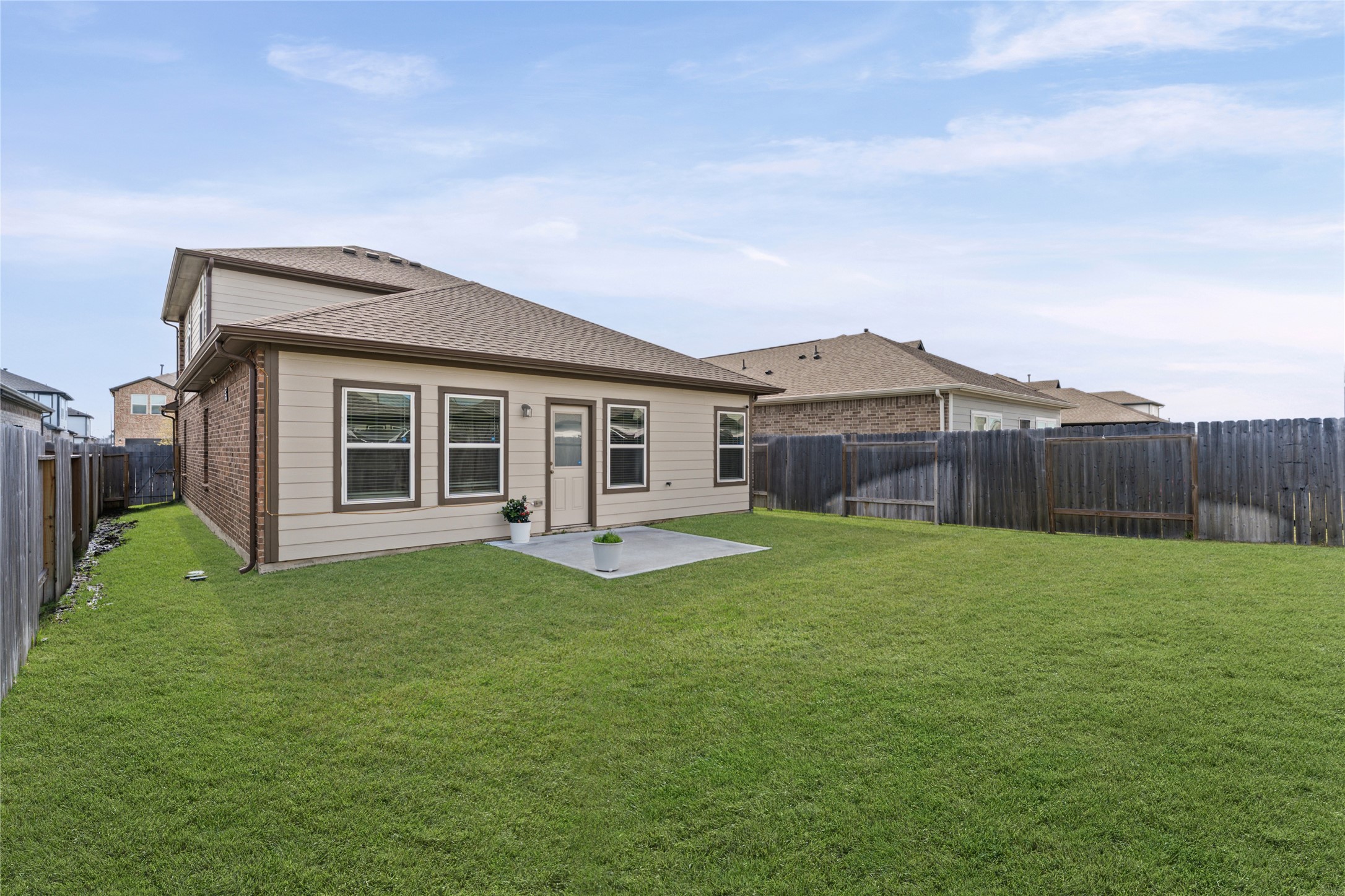 23326 Spring Genesis Lane Katy, TX 77493 - Photo 30 of 32 a house view with a garden space