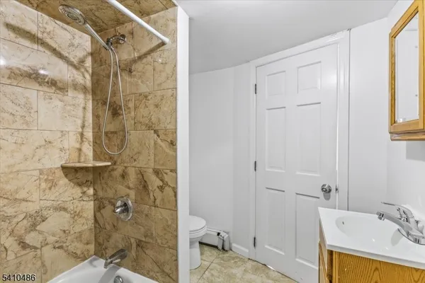 a bathroom with a sink and a shower