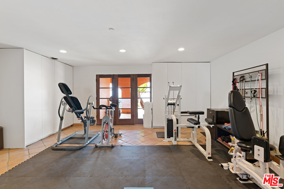 21424 Deerpath Lane Malibu, CA 90265 - Photo 36 of 51 a view of a room with gym equipment