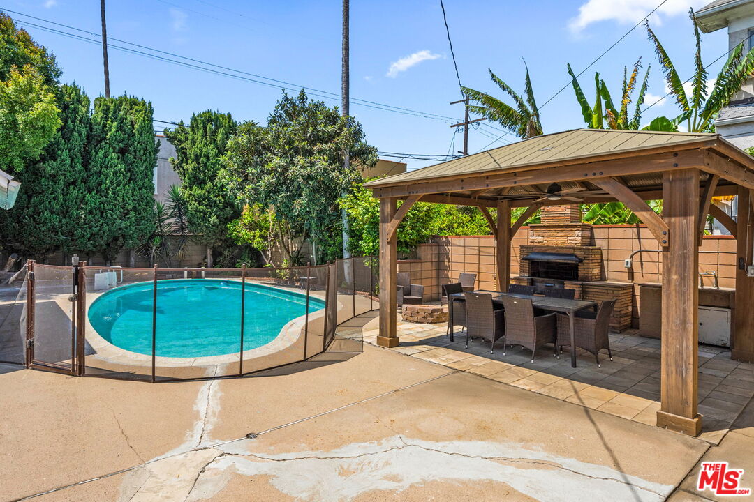 5342 Lemon Grove Avenue Los Angeles, CA 90038 - Photo 1 of 30 a view of a swimming pool with a patio