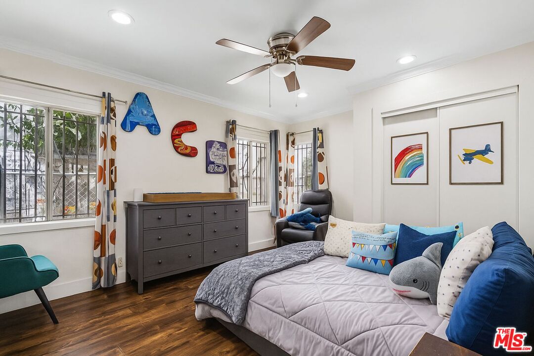 5342 Lemon Grove Avenue Los Angeles, CA 90038 - Photo 14 of 30 a bedroom with a bed and a dresser
