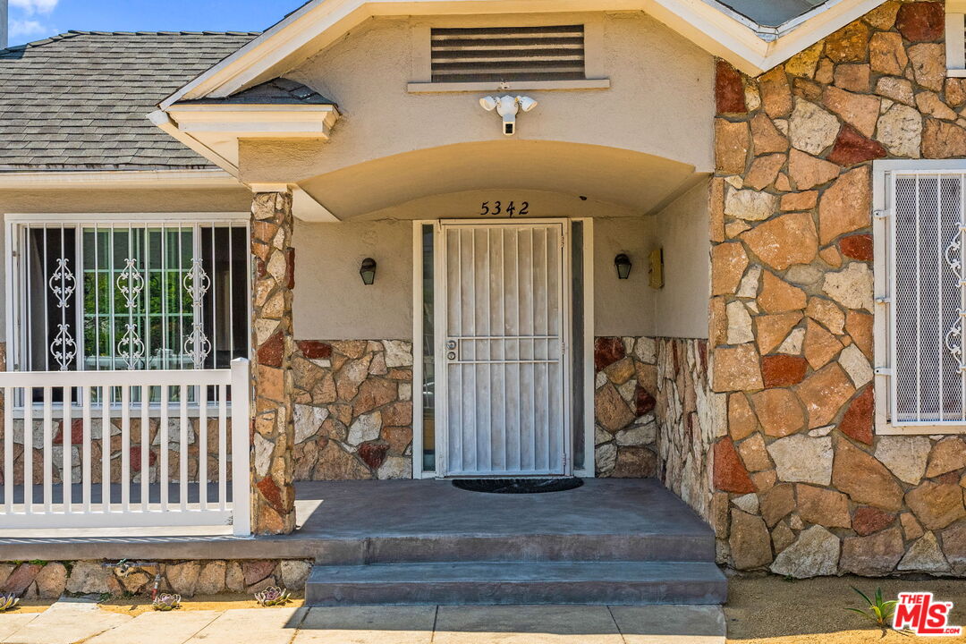 5342 Lemon Grove Avenue Los Angeles, CA 90038 - Photo 4 of 30 a front view of a house with a window