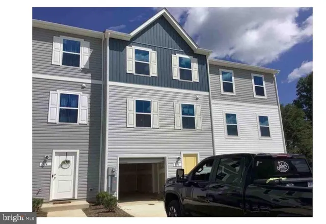 a black and white building with a outdoor space