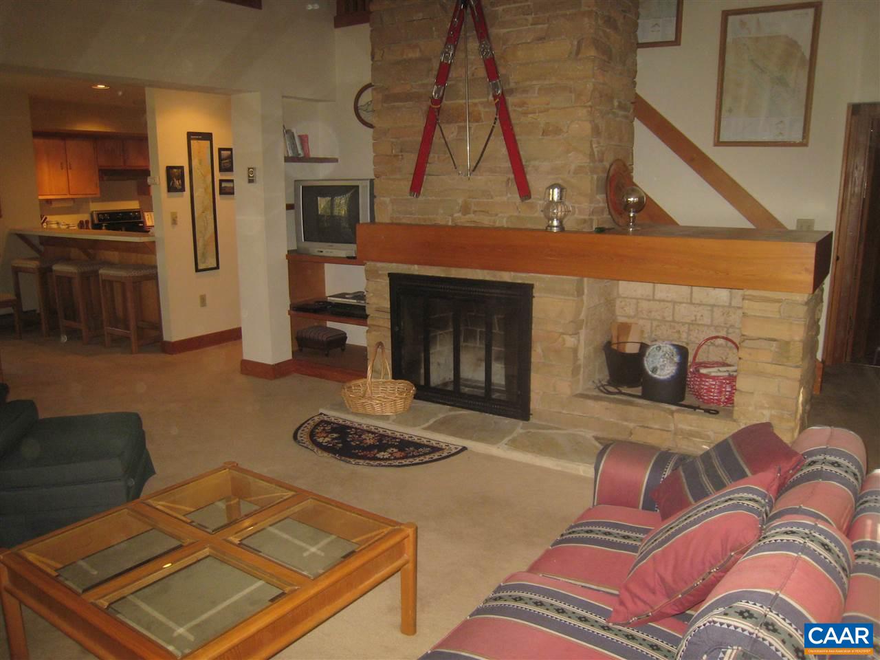 67 Hickory Spring Road Roseland, VA 22967 - Photo 4 of 22 The family room has a beautiful floor to ceiling wood burning fireplace. Enjoy a toasty fire after a day on the trails, or the slopes...