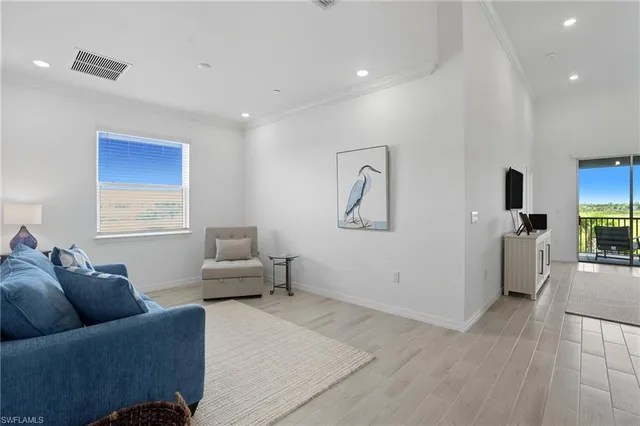 a living room with furniture and a couch