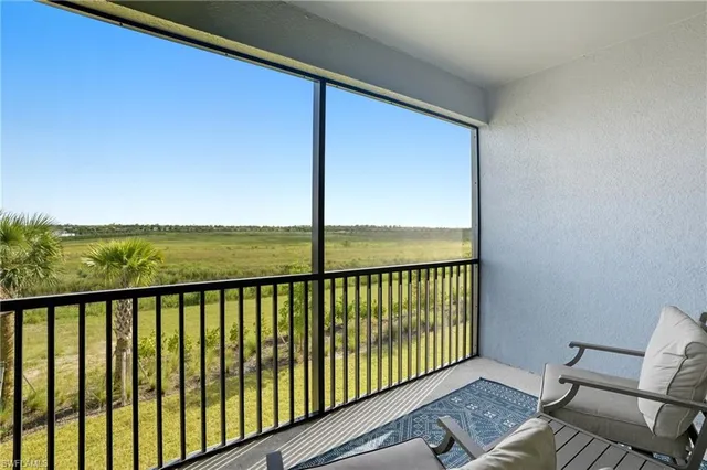 a view of a chair in a balcony