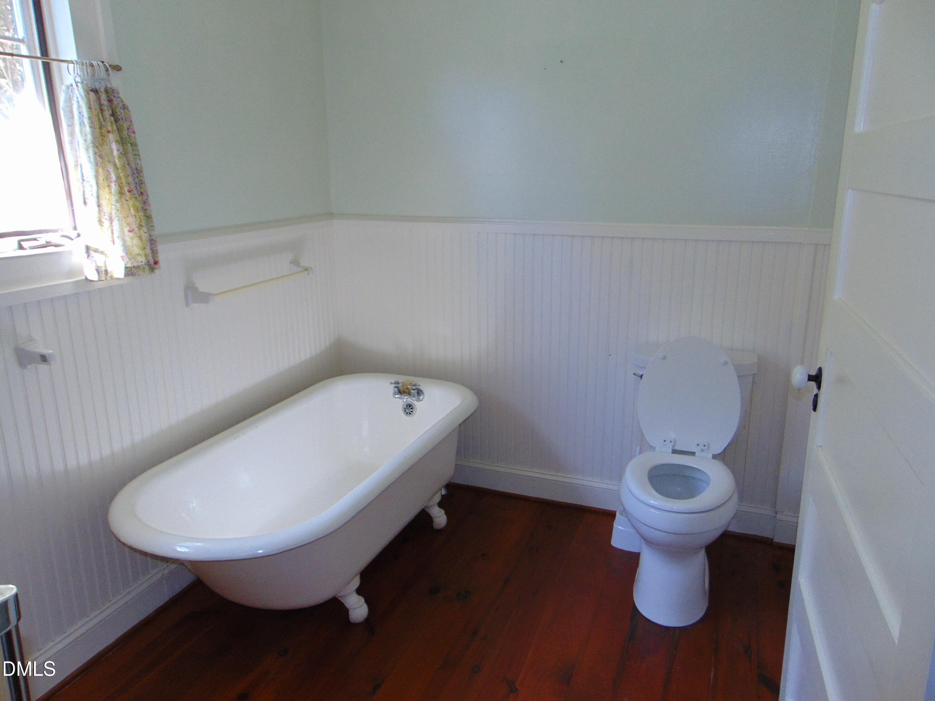 4067 Chewning Road Oxford, NC 27565 - Photo 64 of 82 a bathroom with a toilet and a sink