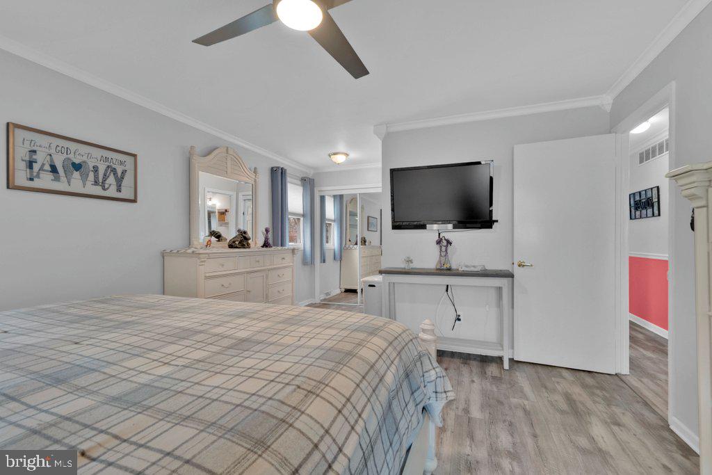 714 Joppa Farm Road Joppa, MD 21085 - Photo 28 of 46 a bedroom with a bed and a flat screen tv