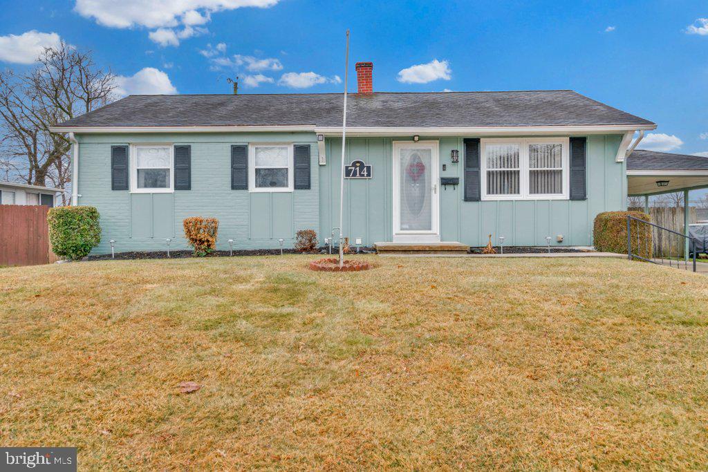 714 Joppa Farm Road Joppa, MD 21085 - Photo 3 of 46 a front view of a house with a yard