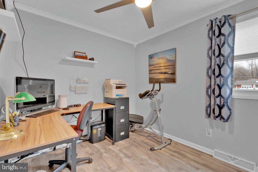 714 Joppa Farm Road Joppa, MD 21085 - Photo 31 of 46 a view of a workspace with furniture and a window