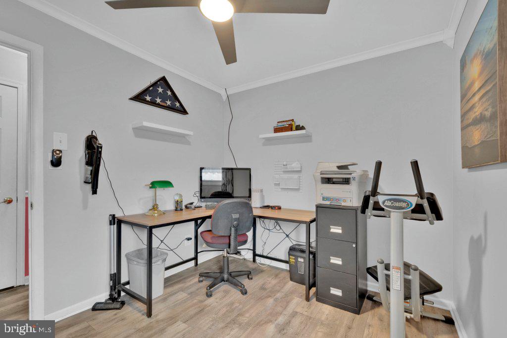 714 Joppa Farm Road Joppa, MD 21085 - Photo 32 of 46 a view of a workspace with furniture and a window
