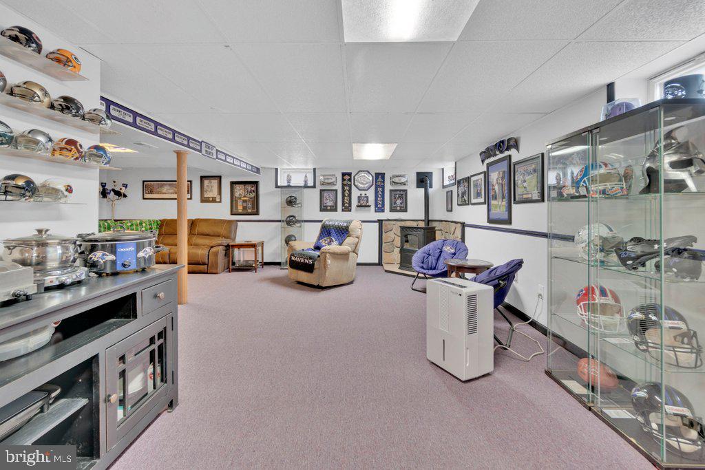 714 Joppa Farm Road Joppa, MD 21085 - Photo 34 of 46 a living room with furniture and a flat screen tv