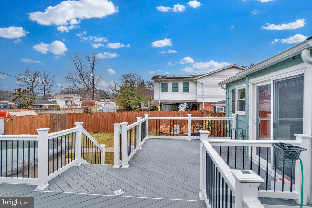 714 Joppa Farm Road Joppa, MD 21085 - Photo 8 of 46 a view of a house with wooden deck and furniture