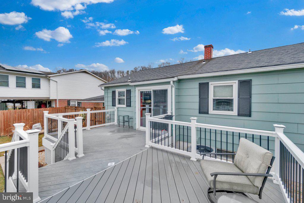 714 Joppa Farm Road Joppa, MD 21085 - Photo 10 of 46 a view of a house with wooden deck and furniture
