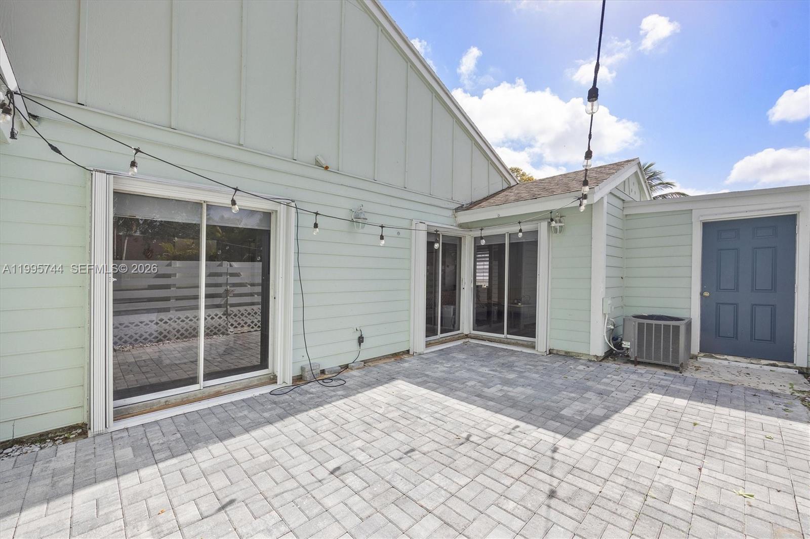 14720 Southwest 139th Avenue, Unit 139 Miami, FL 33186 - Photo 23 of 34 a view of a house with a door