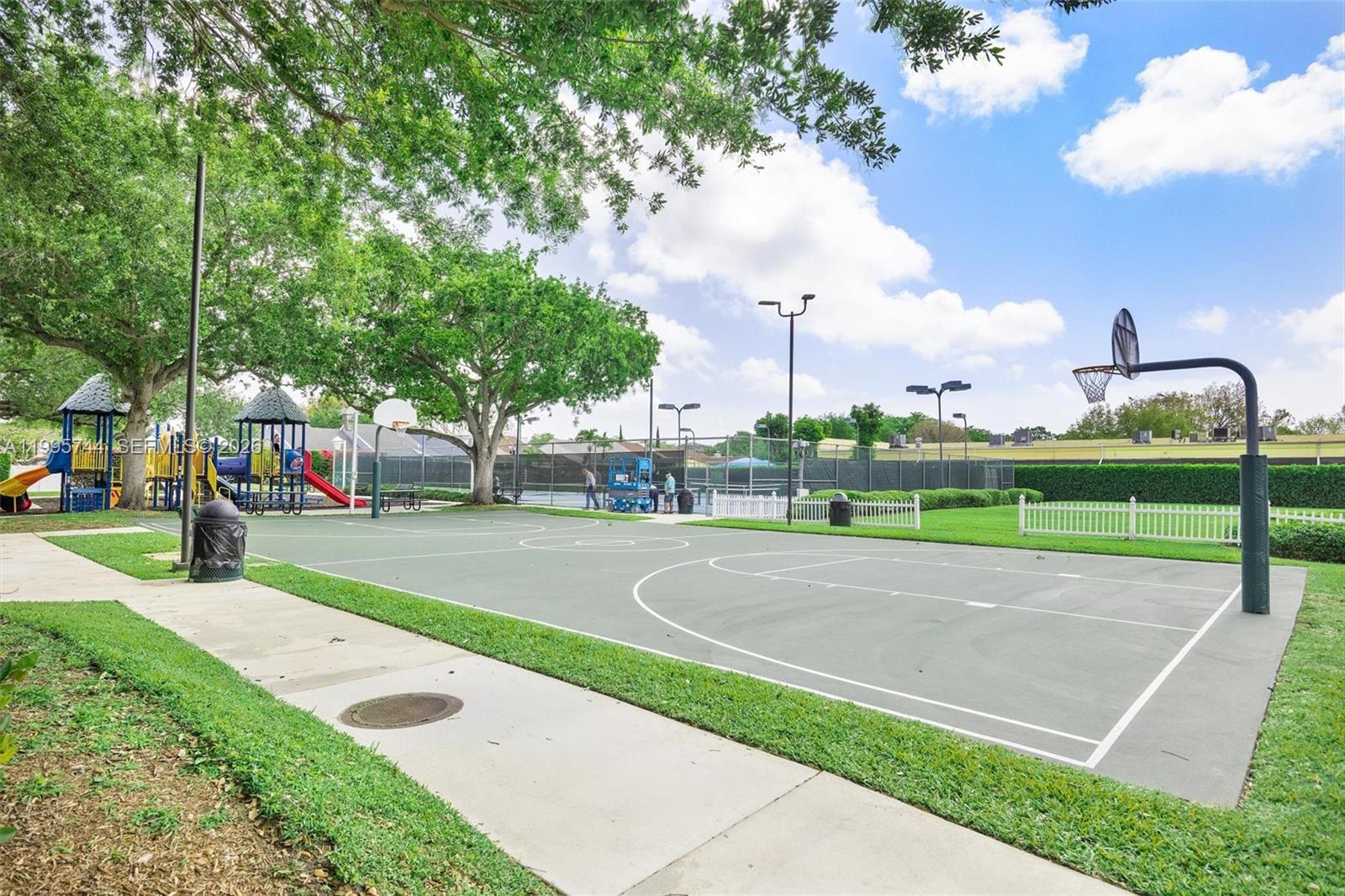 14720 Southwest 139th Avenue, Unit 139 Miami, FL 33186 - Photo 27 of 34 a view of a basketball court