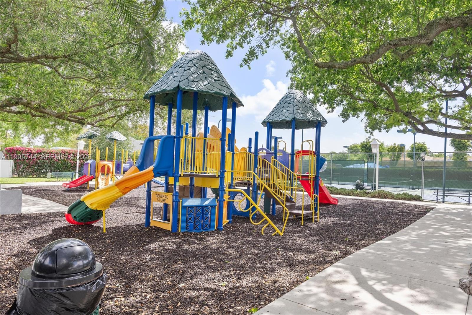 14720 Southwest 139th Avenue, Unit 139 Miami, FL 33186 - Photo 31 of 34 a view of outdoor space with seating