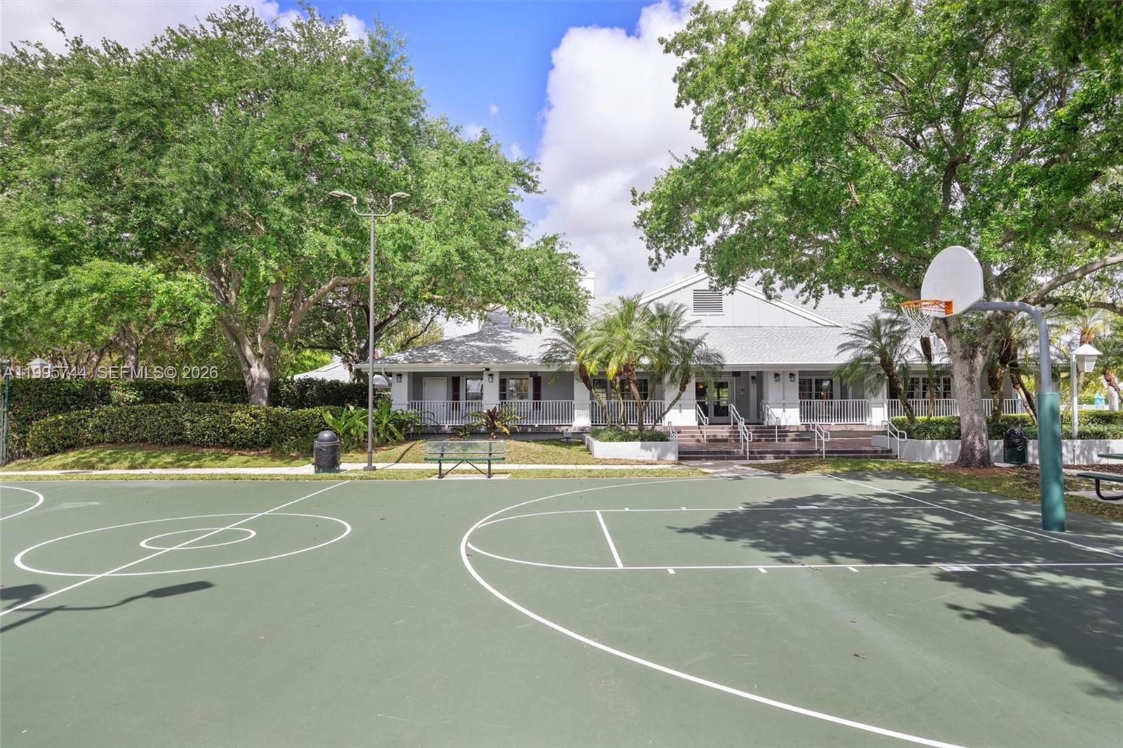 14720 Southwest 139th Avenue, Unit 139 Miami, FL 33186 - Photo 34 of 34 a view of a swimming pool with a patio
