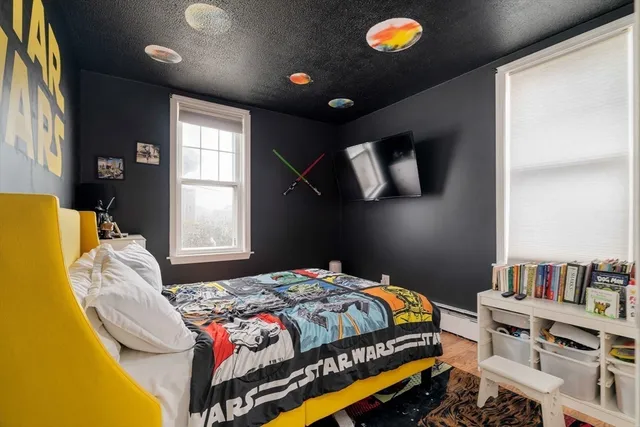 a bedroom with a bed and a closet