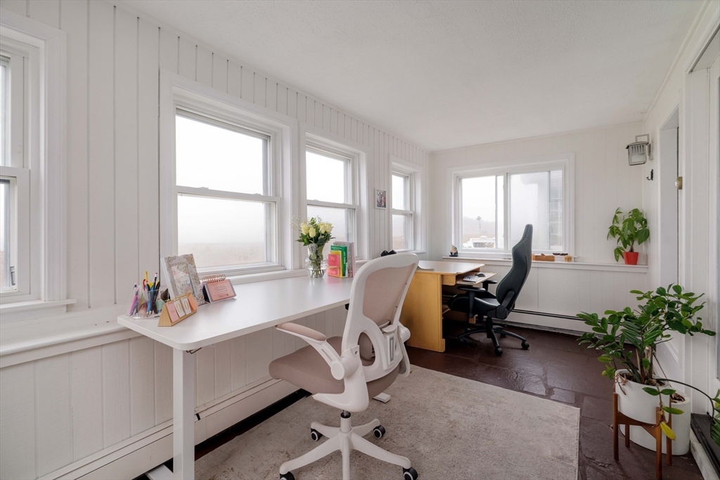 129 The Strand Winthrop, MA 02152 - Photo 28 of 42 a view of a workspace with furniture and a window