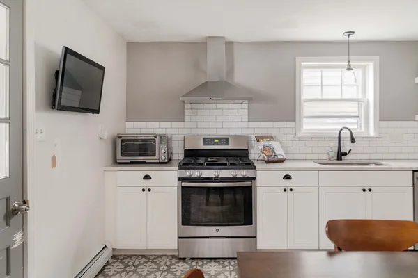 a view of a dining room with furniture