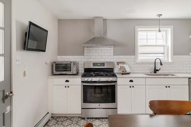 a view of a dining room with furniture