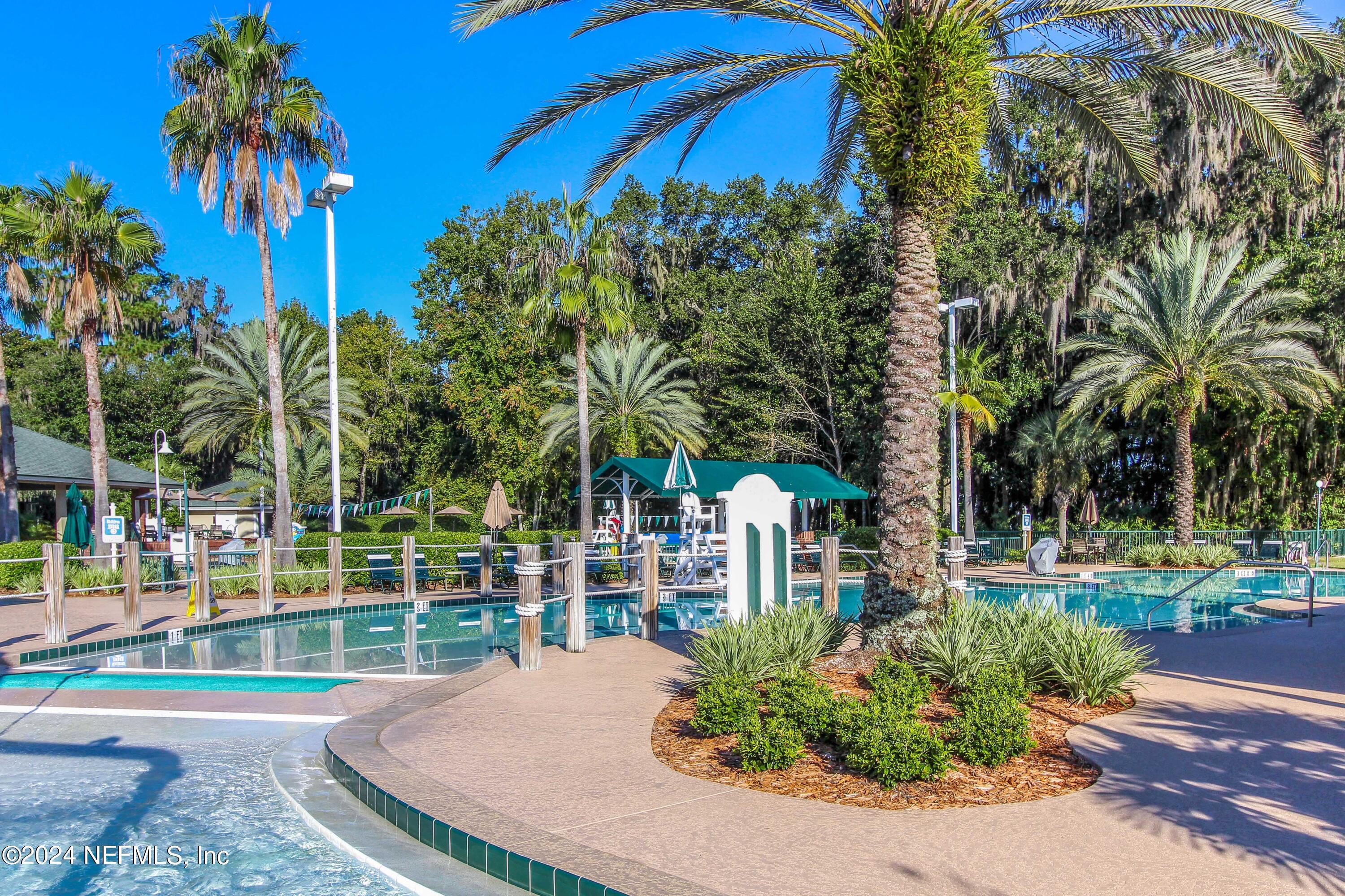 1830 Copper Stone Drive, Unit D Fleming Island, FL 32003 - Photo 60 of 65 iWaterfront Park Family Pool Area