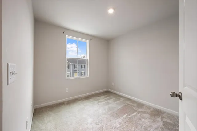 a view of empty room with a window