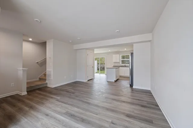 a view of a livingroom with wooden floor