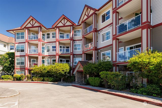 a front view of a multi story residential apartment building