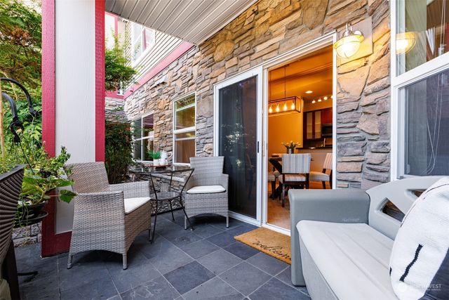 a building outdoor space with patio furniture