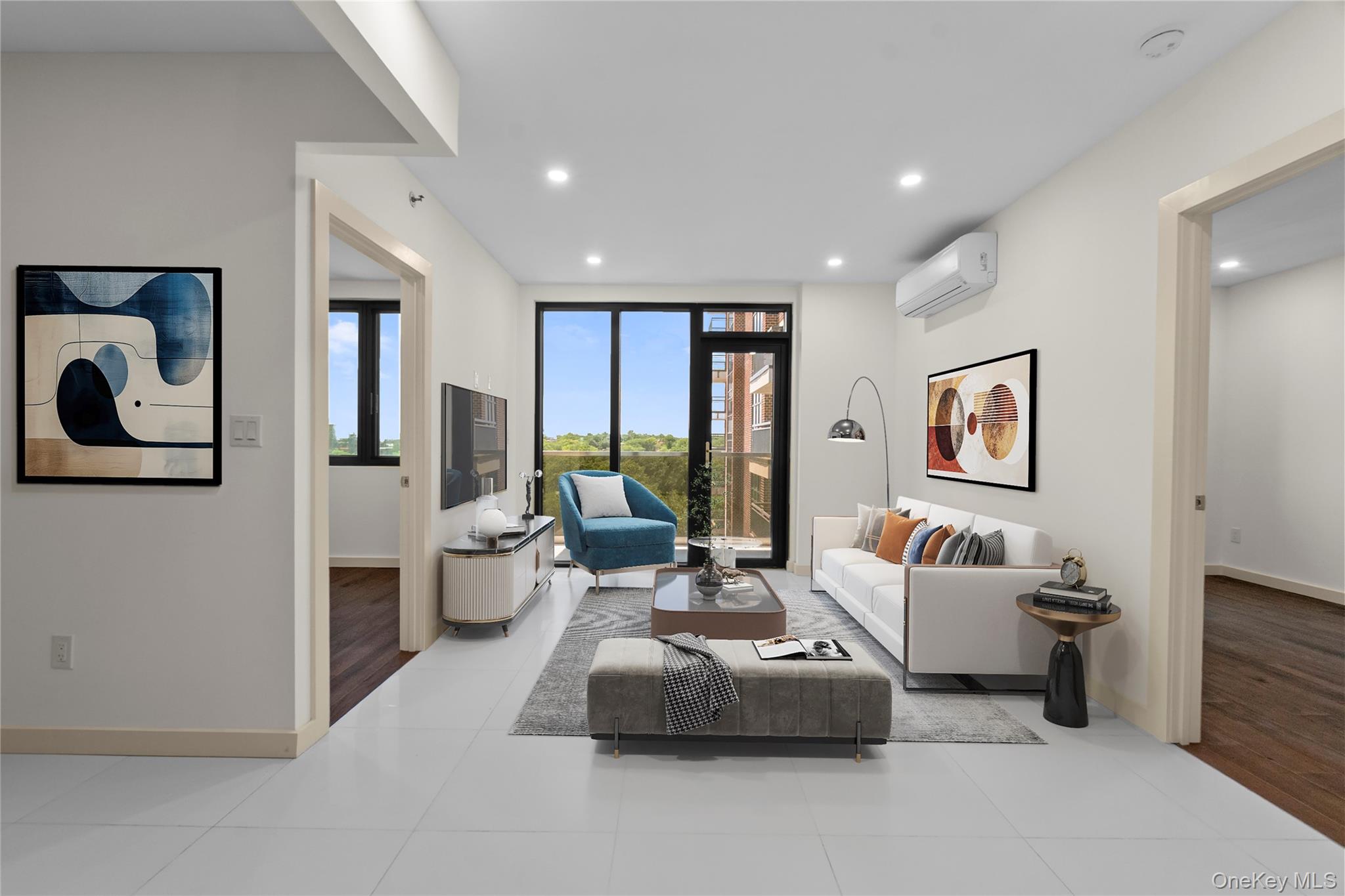 Living area with tile patterned flooring, recessed lighting, and a wall unit AC