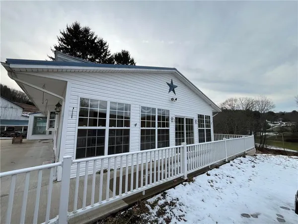 a view of a house with wooden floor