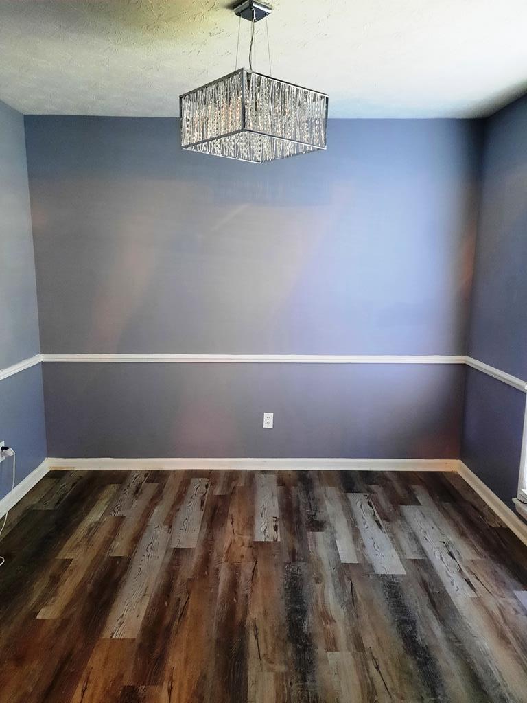 4212 Curry Street Columbus, GA 31907 - Photo 3 of 13 a view of a room with wooden floor and window